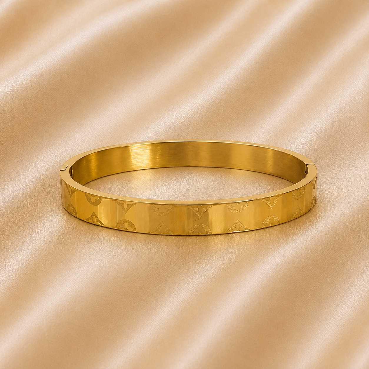 Gold designer Rakhi Kada bracelet for brother with engraved pattern