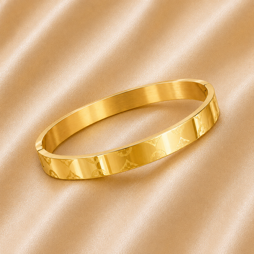 Gold designer Rakhi Kada bracelet for brother with engraved pattern